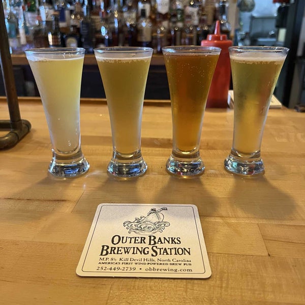 Photo taken at Outer Banks Brewing Station by Lucas M. on 7/7/2022