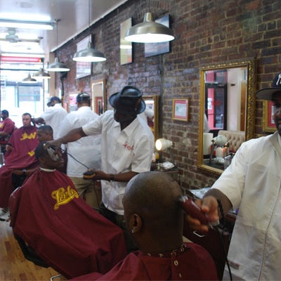 This institution has been featured on VH1, BET, HBO, ESPN, and countless other outlets. That's because it isn't just your average barbershop—it's become a bit of a brand.