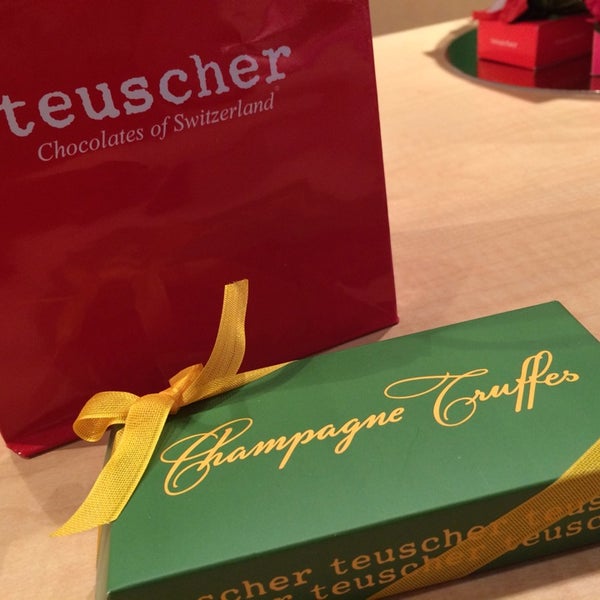 Photo taken at teuscher Chocolates - Rockefeller Center by Ken T. on 2/4/2014