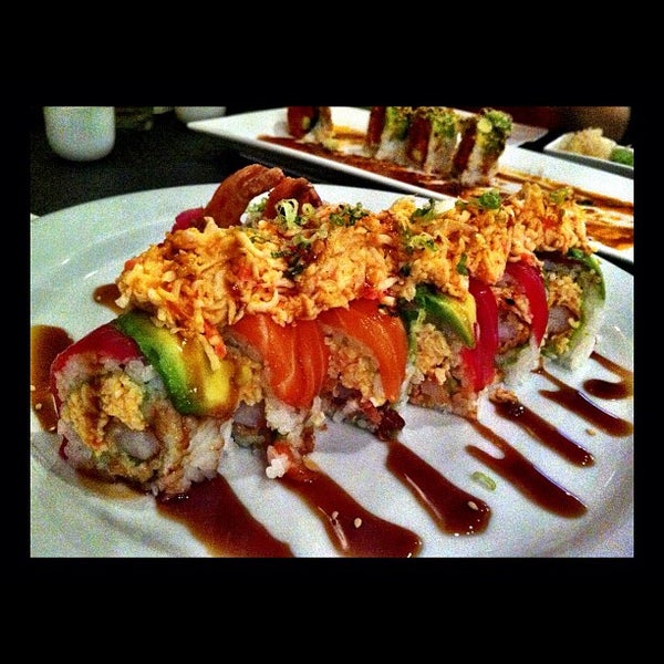 Photo taken at Oops! Sushi &amp; Sake Bar by Matt W. on 10/3/2012