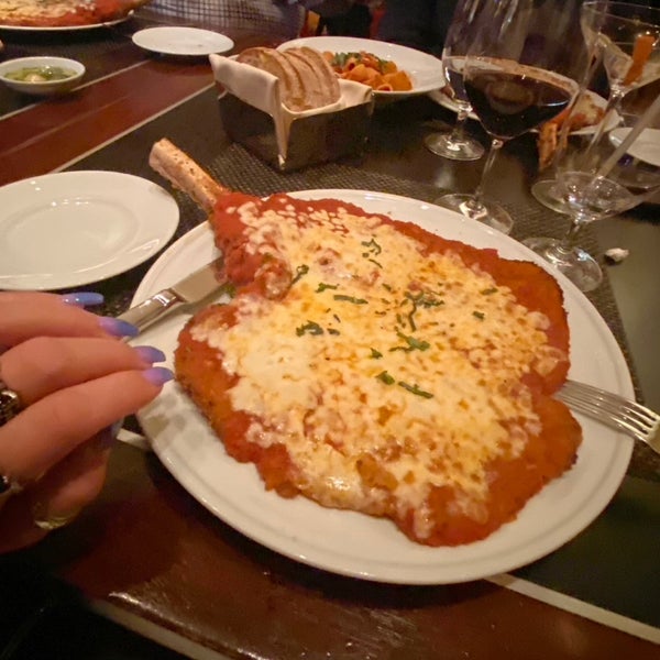 Just for reference, I placed my hand to show how large this veal parm is!! I could not finish it but made enough of a dent. The calamari is exquisite & the service is top notch….save room for dessert