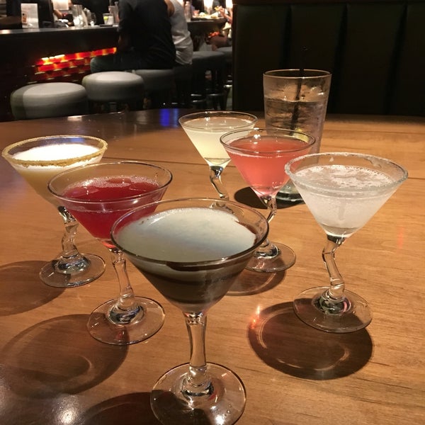 Indecisive about what drink to order? Get a martini flight! Drinks and food were good, but the place smelled weird (like mop water) and the bathrooms were out of TP and messy.