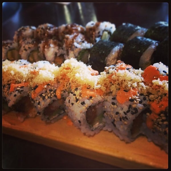 Photo taken at Takara Sushi &amp; Sake Lounge by Dave C. on 4/23/2014