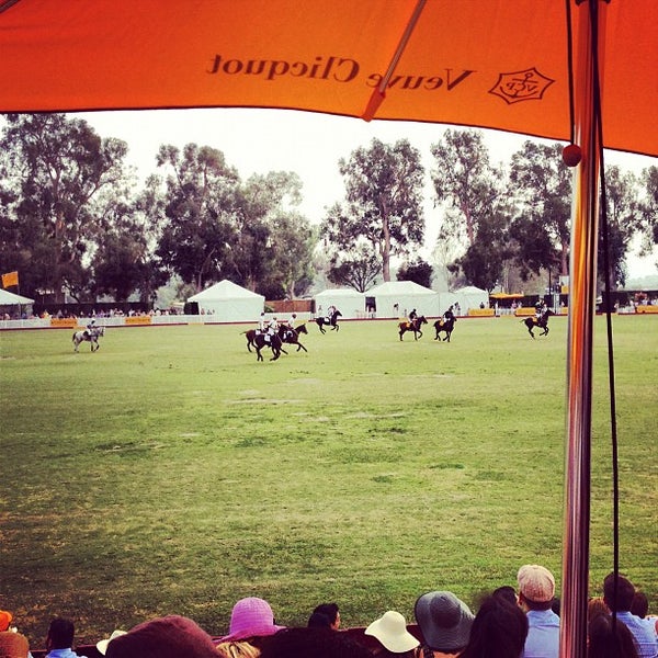 Photo taken at Veuve Clicquot Polo Classic by Adam F. on 10/6/2012