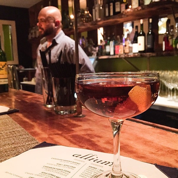 Photo taken at Allium Restaurant + Bar by Find. Eat. Drink. on 2/27/2015