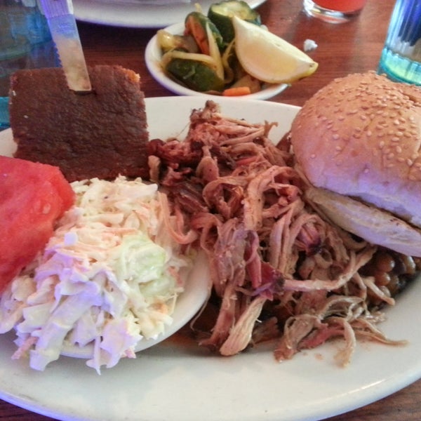 When ordering the Eastern Carolina Pulled Pork Platter, order a side bun to construct a sandwich with pork and coleslaw. The pork chunks are massive and tasty, requiring no additional sauce.
