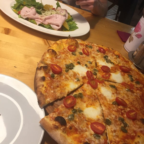 Had to wait for pizza & salad for 25 minutes, waiters forgot to bring us our order. Pizza was cold but edible. Salad with turkey..turkey was not actual meat but cold slicing from the supermarket :(