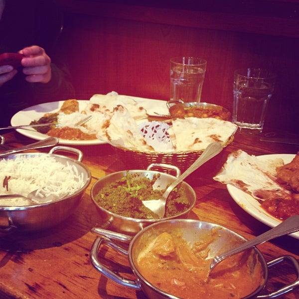 Photo taken at Brick Lane Curry House by Jesse M. on 12/19/2012