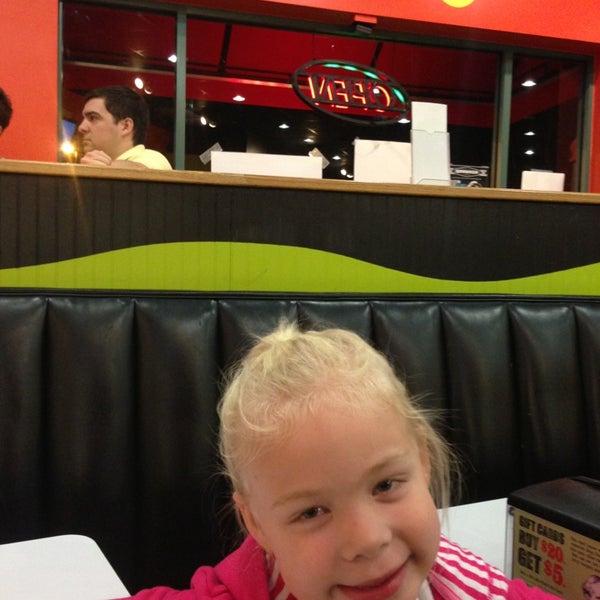 Photo taken at MOOYAH Burgers, Fries &amp; Shakes by Andy A. on 12/18/2012