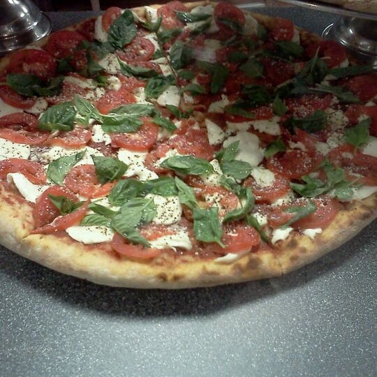 Photo taken at Peace A Pizza by Sally C. on 1/16/2013