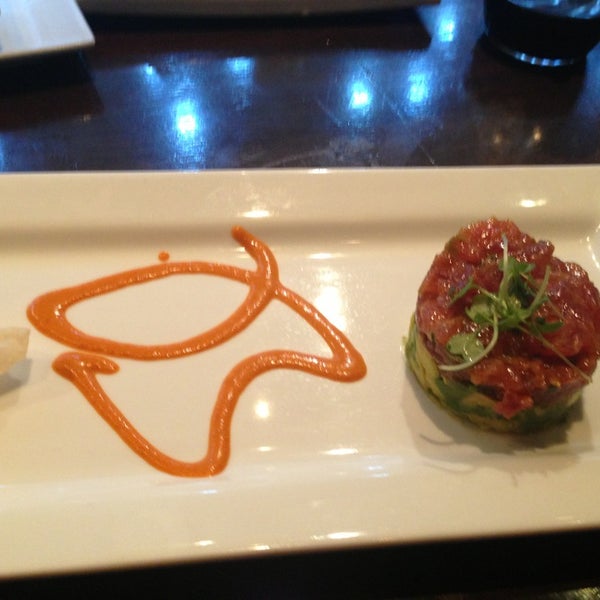 Photo taken at Okura Robata Sushi Bar and Grill by Debbie M. on 2/18/2013