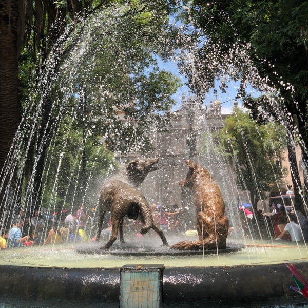 Photo taken at Jardín Centenario by Johnny L. on 7/7/2018