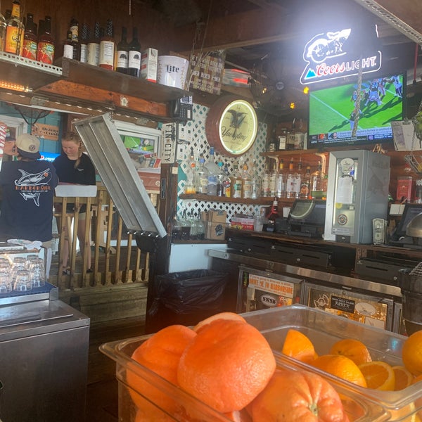 Photo taken at Harborside Bar &amp; Grill by Jason S. on 7/6/2022