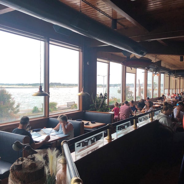 Photo taken at Harrison&#39;s Harbor Watch Restaurant &amp; Raw Bar by Jason S. on 8/11/2018