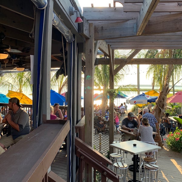 Photo taken at Macky&#39;s Bayside Bar &amp; Grill by Jason S. on 7/25/2019