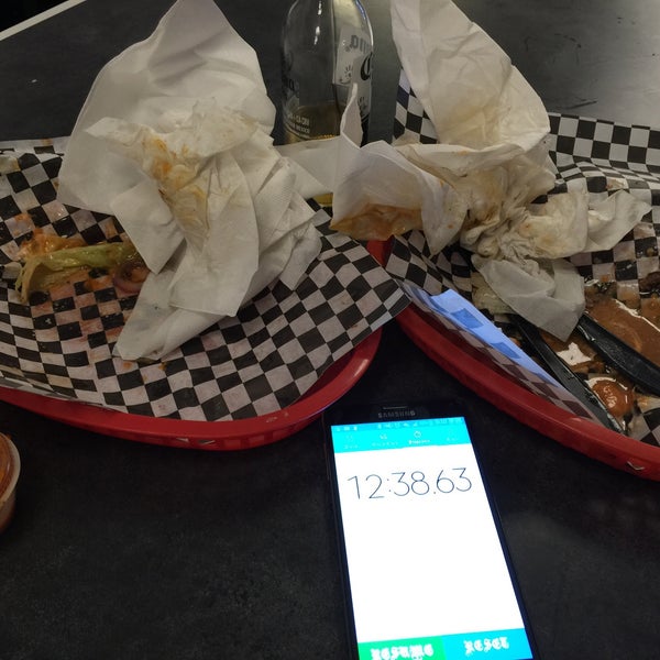 I get 2 double burgers. That's 2 lbs of protein. Think you got what it takes to beat my time? Ask John what my latest time is and beat it for your picture on the wall. My last time was 12min 38sec.