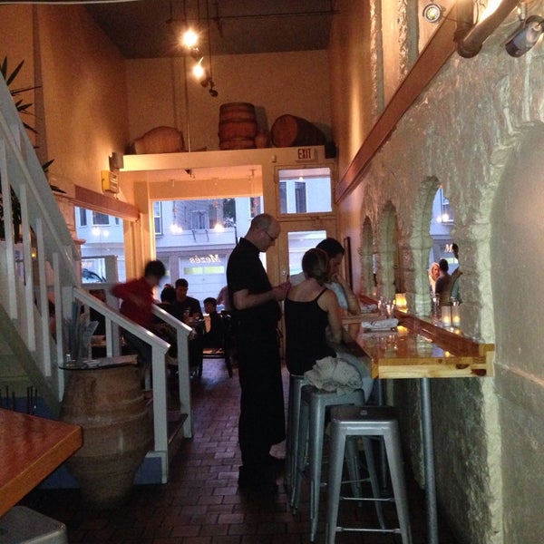 Foto diambil di Mezes Kitchen &amp; Wine Bar oleh Cristina H. pada 6/15/2014