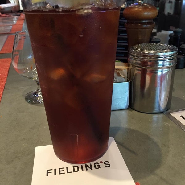 Photo taken at Fielding&#39;s Wood Grill by Jerry J. on 7/24/2015