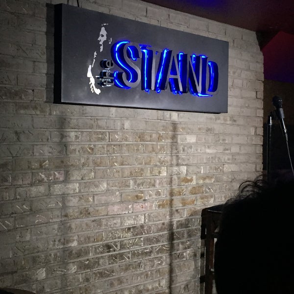 Photo taken at The Stand Restaurant &amp; Comedy Club by Matt F. on 7/3/2015