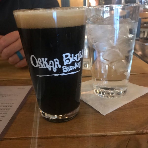 Photo taken at Oskar Blues Grill and Brew by Jacob B. on 1/4/2019