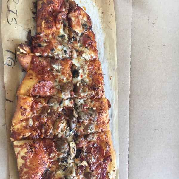 I got a Husky pepperoni, bacon, sausage and mushroom with the spicy red sauce. It is a good pizza joint, except you will wait in line like getting Beer at a Preds game.