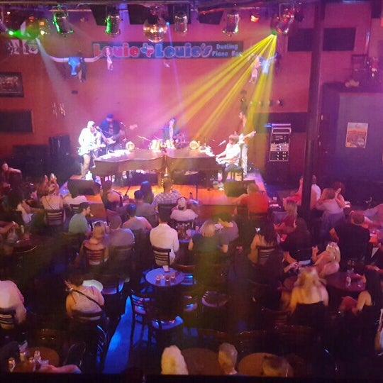 Photo taken at Louie Louie&#39;s Dueling Piano Bar by Alec C. on 5/29/2016