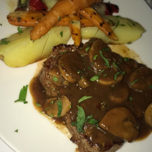 The fillet steak is beautifully cooked and served. The delicious food and stunning views of the island are just perfect.