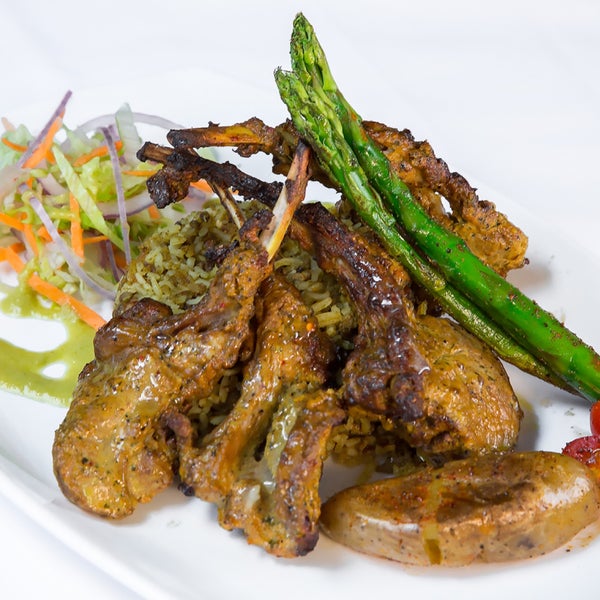 Lamb chop served with asparagus and keema rice