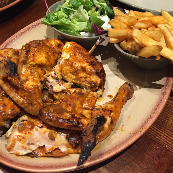 Photo taken at Nando&#39;s by Anne H. on 11/13/2015