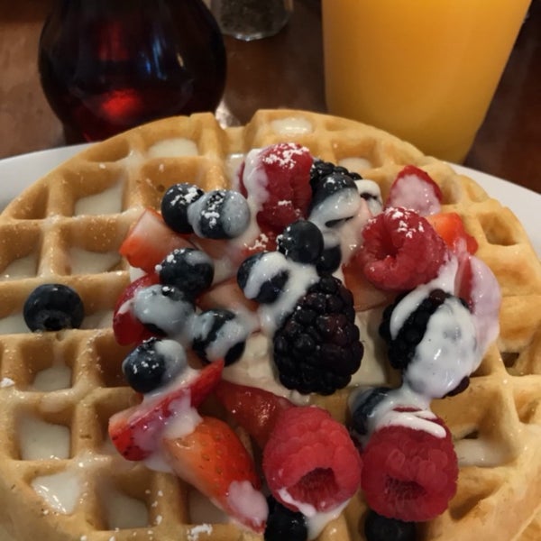 Recommend berry waffles with orange juice or organic coffee.