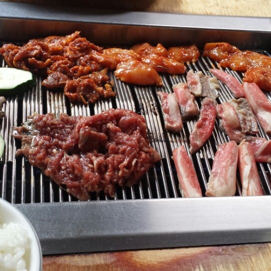 Photo taken at Wharo Korean BBQ by Jen K. on 12/18/2013