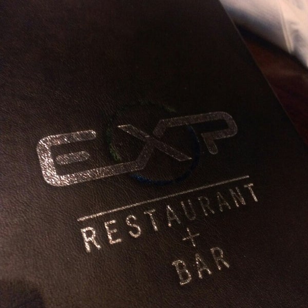 Photo taken at EXP Restaurant + Bar by Richard L. on 6/8/2014