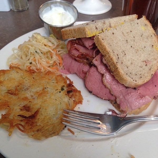 Photo taken at Grumans Catering and Delicatessen by Alan F. on 3/15/2014