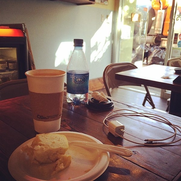 Photo taken at Frog&#39;s Crown Bakery by Jessica V. on 5/19/2014