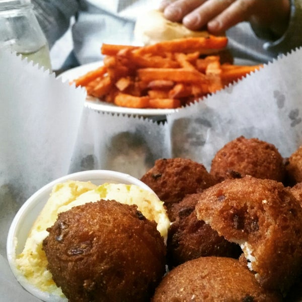 I love the Hush Puppies and the Peach Butter! My husband loves BBQ, and thinks they have a great menu, but I usually order a chicken sandwich. Great location on the Market.