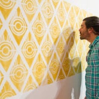 Don't miss the 735 photographs of roti that make up one piece in the "Around the Table" exhibition. Also, check out the fragrant wallpaper.