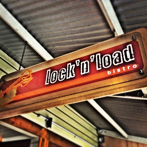 Photo taken at Lock&#39;n&#39;Load Bistro by Rental Express Property Management on 5/11/2013
