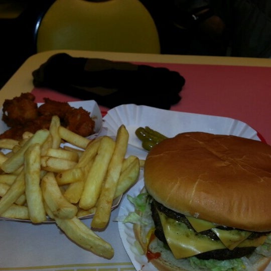 Photo taken at Mr. J&#39;s Dawg &amp; Burger by John V. on 1/27/2013