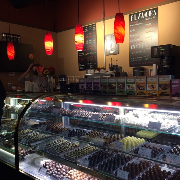 Photo taken at Coffee &amp; Chocolate by Julianna M. on 11/8/2015