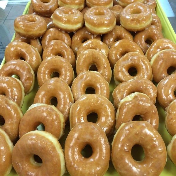 Check out this picture! Our glazed donuts are hot and fresh starting at 4:30 am every morning. They're very famous as they're being bought by dozen for schools, business meetings and party.