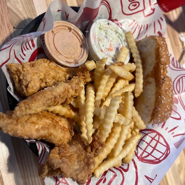 Photo taken at Raising Cane&#39;s Chicken Fingers by Tim Z. on 5/30/2022