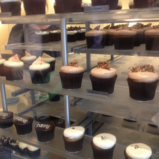 Photo taken at More Cupcakes by Frances C. on 9/30/2012
