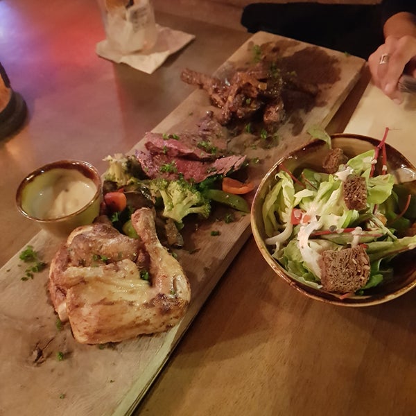 Cozy steampunk restaurant with live bands, perfect grilled meat, tasty cocktails and all around good vibe