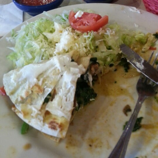 Photo taken at La Parrilla Mexican Restaurant by Mercedes S. on 12/18/2012