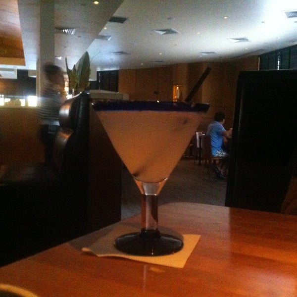 Photo taken at Cantina Laredo by Gs on 1/12/2013