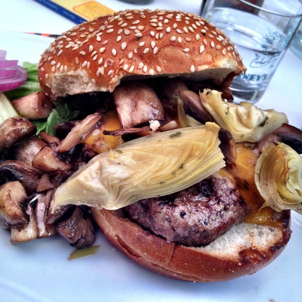 Photo taken at Barney&#39;s Gourmet Hamburgers by John E. on 5/25/2013