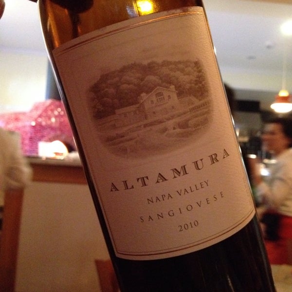 LOVED Altamira Sangiovese wine and pizza. Great crust and home-made sausage. Really good calamari. Don't skip dessert - the traditional tiramisu with a glass of cognac is delish.