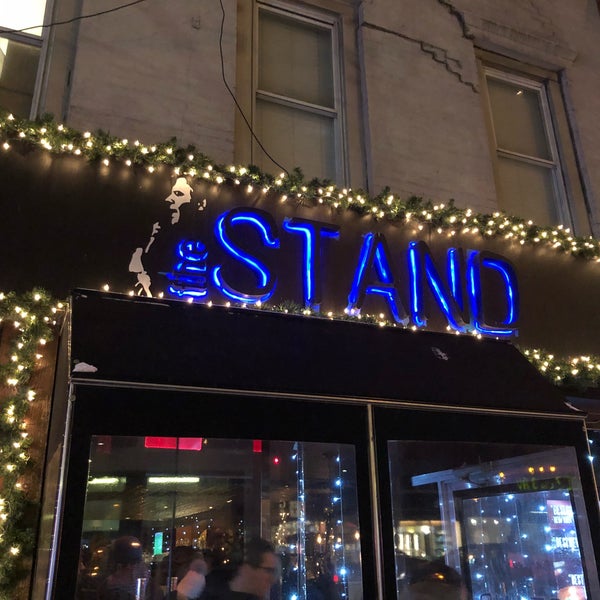 Photo taken at The Stand Restaurant &amp; Comedy Club by Carlos K. on 12/31/2017