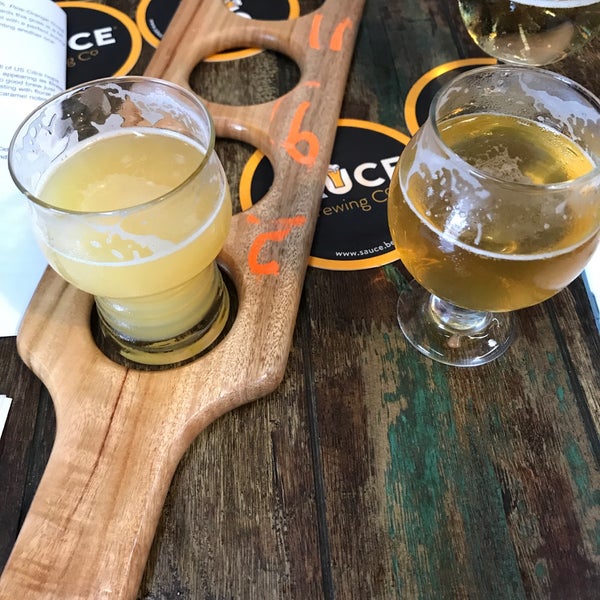 Photo taken at Sauce Brewing Co by Mark R. on 3/9/2019