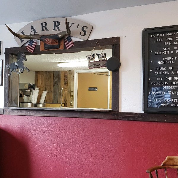 Photo taken at Hungry Harry&#39;s Famous BBQ by Gregory W. on 7/8/2021